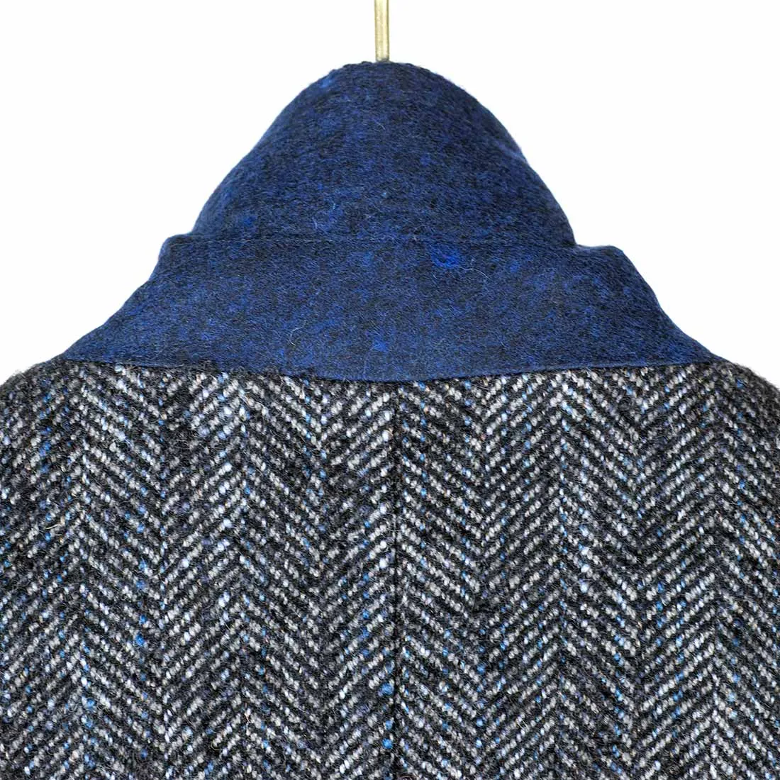 Blue herringbone mix peaked lapel overcoat